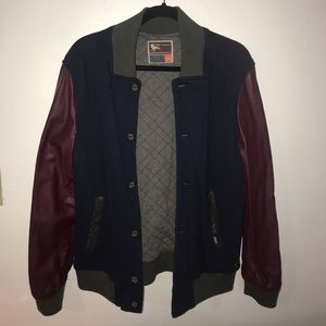 Men’s modern amusement varsity jacket. Size medium